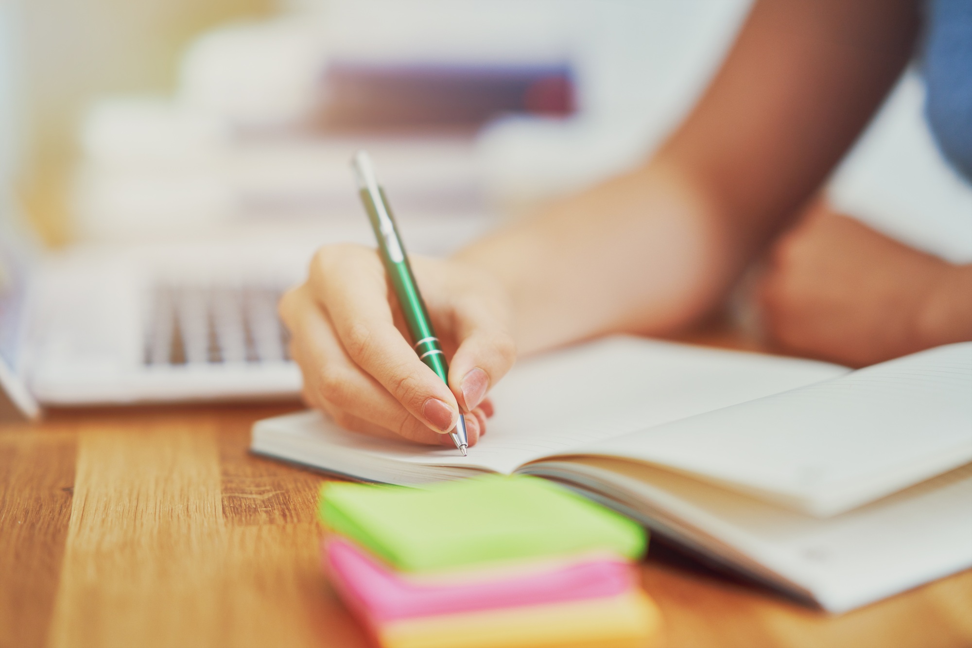 Teenage girl having online classes at home