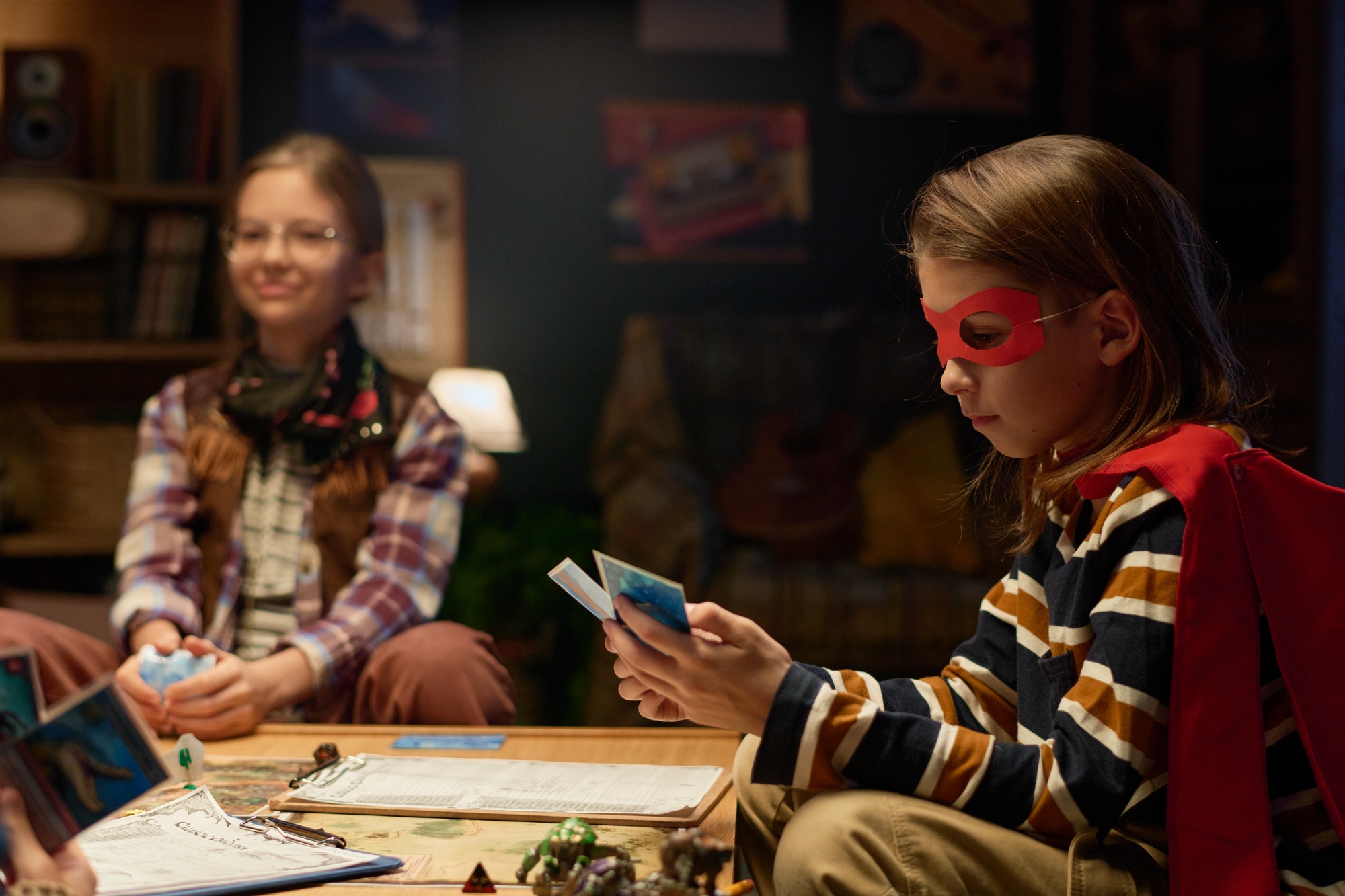 Boy looking through board game cards